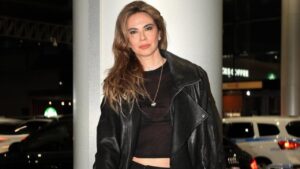 Luciana Gimenez. Mulher branca, cabelo castanho longo.
