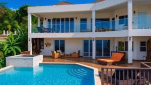 MC Cabelinho e musa da Salgueiro ostentam em mansão de R$ 4 mil na Jamaica